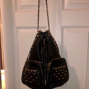 black and gold mini backpack